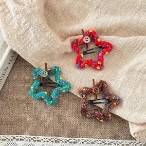 Three-piece set of knitted star hair clips with colorful polka dots and cute bow details