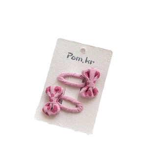 Lot de deux pinces à cheveux roses avec nœuds et motifs de cœurs pour filles