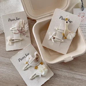 Lot de trois paires de barrettes à cheveux mignonnes avec motifs de lapin et cygne