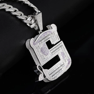 Iced out S letter pendant necklace with sparkling cubic zirconia on heavy cuban chain