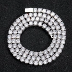 Detailed close-up of a silver-toned tennis bracelet with sparkling round-cut zircon stones
