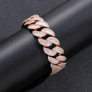 Macro shot of rose gold Miami Cuban link chain with T-square and round zircon stones