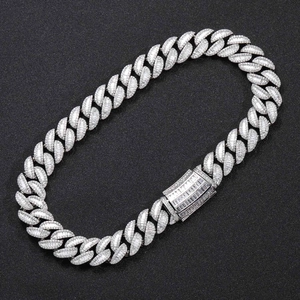 Detailed close-up of a silver Cuban link chain with T-square and round zircon stones