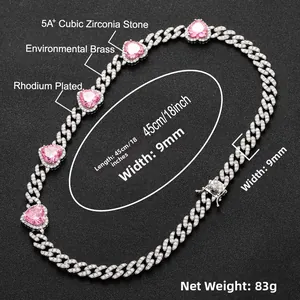 Detail of 9mm pink heart cubic zirconia cuban link necklace in rhodium plated brass