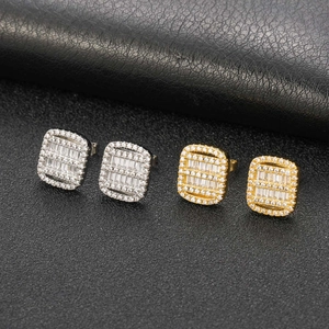 Iced-out hip hop square stud earrings in gold and silver with baguette-cut zircons