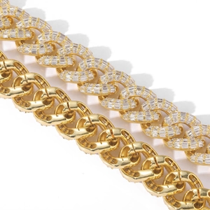 Detail of 16mm gold Cuban link chains with baguette-cut zircons in hip-hop style