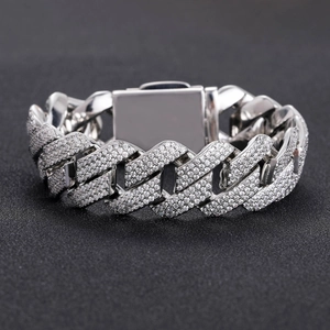 Close-up of 20mm rhodium-plated Cuban link necklace with sparkling zircon pavé setting
