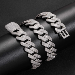 Macro view of 20mm 925 sterling silver three-row moissanite iced out Cuban link chain