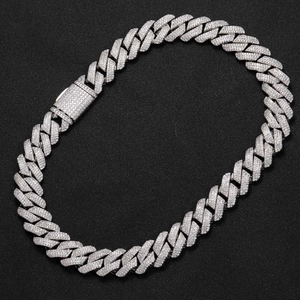 Macro detail of 925 silver Cuban link chain featuring Moissanite pavé and secure box clasp