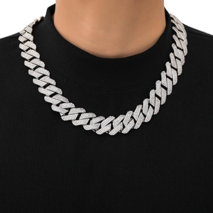 Close-up of 925 silver Cuban link necklace with triple-row moissanite diamonds pave-set style