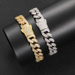Gold and silver 12mm Cuban link bracelets with micro-pave zircons and spring clasp