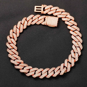 Macro shot of 20mm rose gold Cuban link necklace with triple-row pavé set cubic zirconia