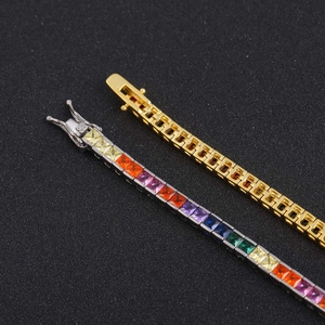 Detailed macro view of square zircon tennis bracelets with gold and silver plating