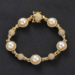 Luxury gold hip-hop bracelet with large white pearls and micro-pave diamond spheres