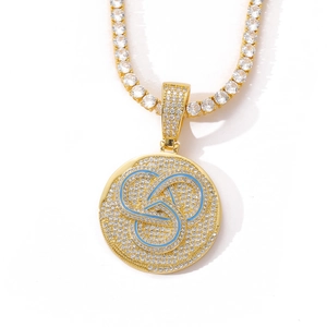 Macro shot of hip-hop tennis chain with round micro-pave zircon pendant and blue enamel