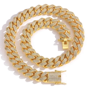 Detailed close-up of 18mm golden iced-out Miami Cuban chain with micro-pave cubic zirconia