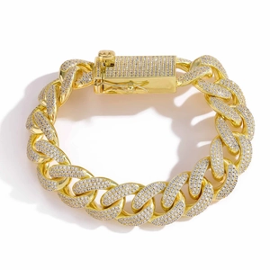 Detailed close-up of 18mm golden Cuban link chain with triple-row iced out zircon stones