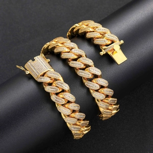 Macro view of 18mm golden Cuban link chain with micro-paved cubic zirconia stones