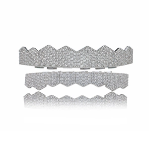 Iced out hip hop grillz set with S925 silver finish and moissanite stones for teeth