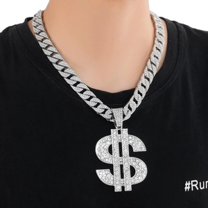 Macro view of iced-out dollar sign pendant on silver Cuban link chain for men