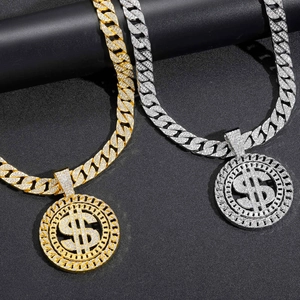 Detailed view of hip hop dollar sign necklaces with gold and silver iced out Cuban chains
