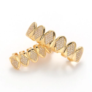 Macro view of gold hip hop grillz with diamond micro-pave cubic zirconia rhinestones