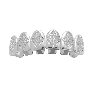 Macro shot of silver hip-hop grillz featuring micro-paved sparkling cubic zirconia stones