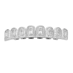 Close-up of hip hop silver grillz with baguette-cut zircons and iced-out micro pave