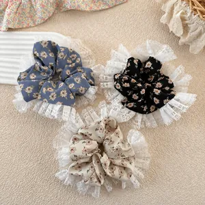 Floral fabric hair scrunchies with white lace trim in blue, black and beige color set