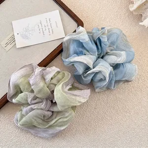 Floral chiffon scrunchies in blue and Morandi tones for elegant ponytail styling
