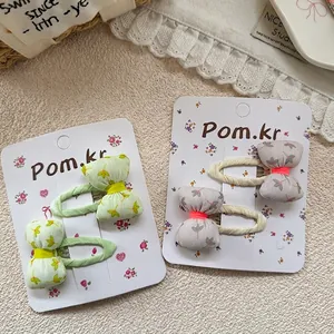 Floral pattern bow hair clips for girls featuring sweet spring style fabric design
