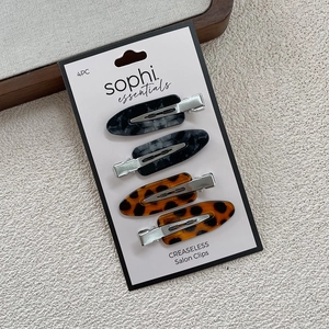 Detail of 4-pack creaseless hair clips with marble and tortoiseshell patterns