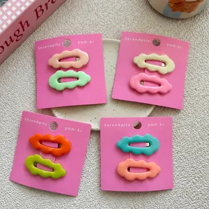 Colorful wavy candy-colored hair clips set for girls on a pink display card