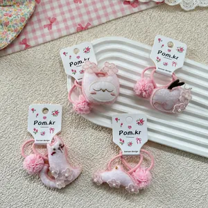 Pink cartoon hair tie set with rabbit and floral embroidery on cute elastic bands for girls