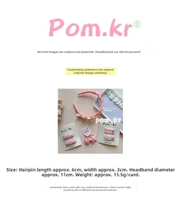 Detailed view of pink lace headband and plaid bow hair clips for girls hair styling
