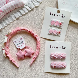 Pink checkered girl hair accessory set with lace headband and cute bow hairpins