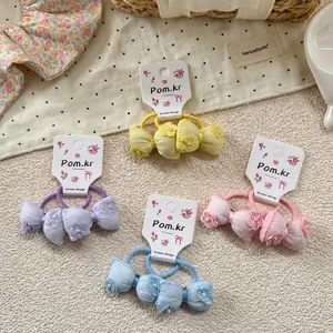 Pastel bow hair ties with lace flowers and pearls in four macaron colors