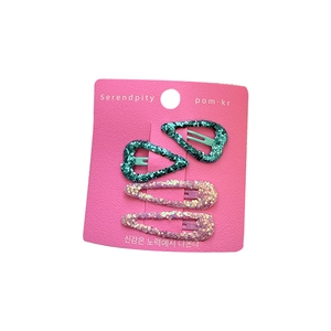 Sparkly glitter heart hair clips set in pink and blue for girls on display card