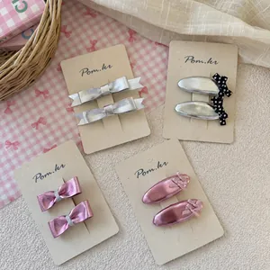 Set di fermagli per capelli per bambine con fiocchi in ecopelle rosa e argento