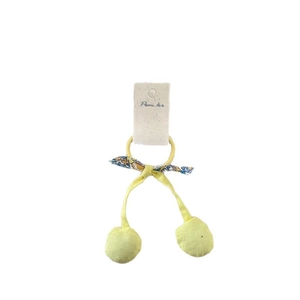 Élastique cheveux jaune pour filles avec nœud fleuri et pompons sur carte