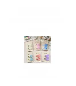 Detailed set of handmade floral fabric hair clips in six colors with size dimensions