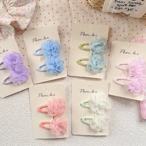 Floral hair clips for girls in macaron colors including purple, blue, pink and green