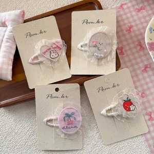 Pink lace hair clips set with cute embroidery of rabbits, hearts, and cherries
