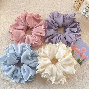 Elegant ruffled scrunchies set in pink, purple, blue, and white soft chiffon fabric
