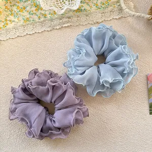 Elegant ruffled chiffon scrunchies in soft blue and purple for women hair styling