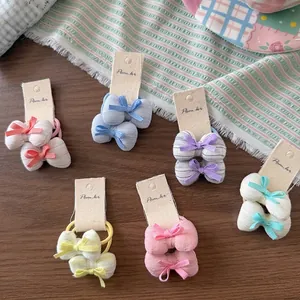 Lot de six élastiques à cheveux pour enfants avec nœuds tricotés colorés