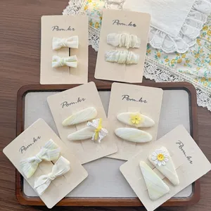 Ensemble de barrettes à nœud en dentelle jaune crème pour filles sur carte cadeau