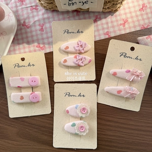 Set aus Haarspangen mit rosa Blumenstoff, Schleifen und Herzen im süßen koreanischen Stil