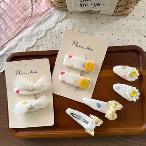 Chic Korean style fabric hair clip set with lace bows and floral buttons for girls