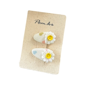 Pair of Korean style fabric hair clips with floral pattern and bright yellow buttons